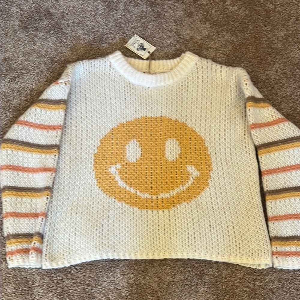 Easel smiley face sweater